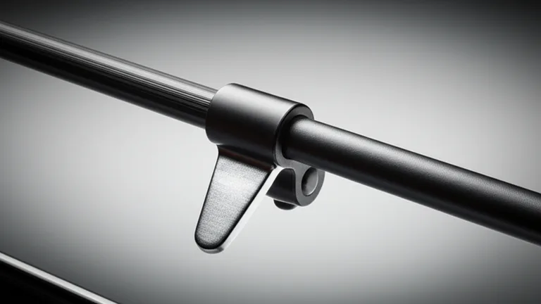 Extreme close-up macro photograph of a quick-release egress mechanism on a matte black steel telescopic window bar