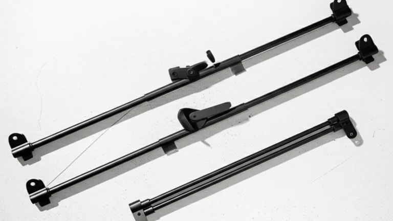 Overhead flat lay of three matte black powder-coated steel window bar models showing telescopic adjustment and quick-release lever mechanisms