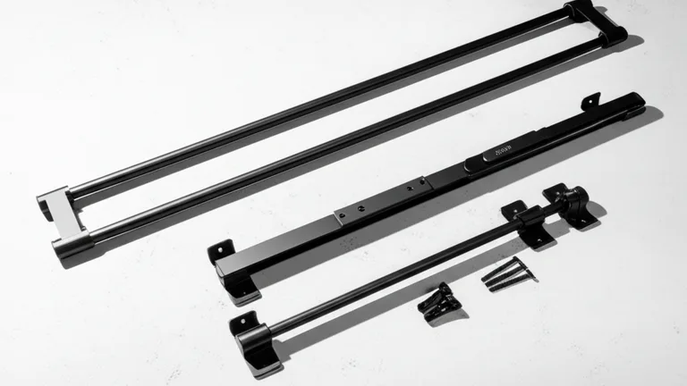 Three types of steel window security bars — telescopic, wall-mount, and egress — displayed as flat lay product photography on white surface